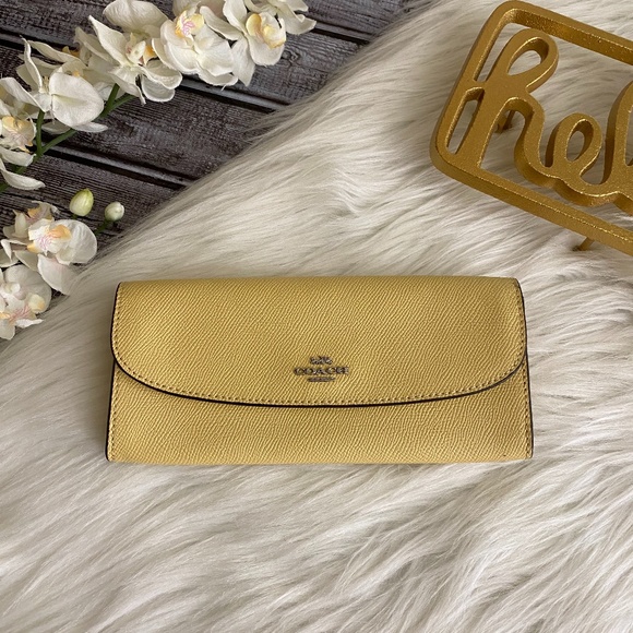 Coach Handbags - NWT Coach Soft Trifold Wallet Vanilla Yellow